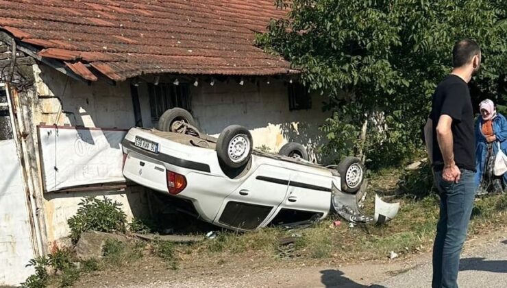 Takla atan otomobilden yaralı kurtuldular