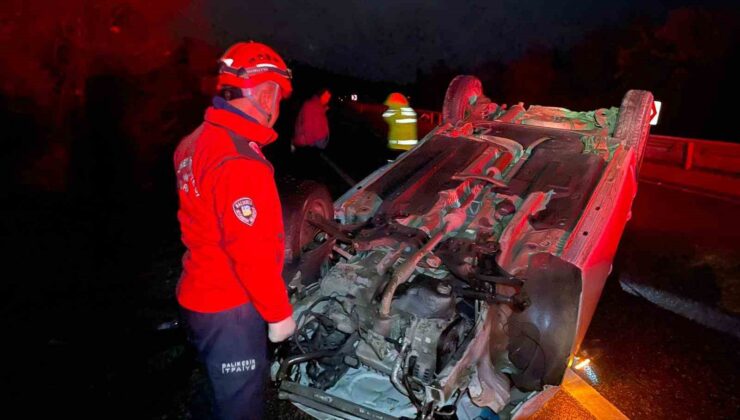 Takla atan araçtan yaralı kurtuldular